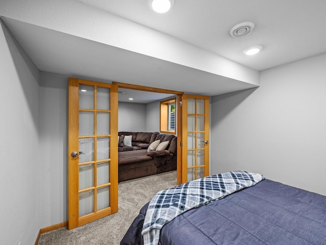 724 2nd Ave S, Buffalo, MN 55313 - carpeted bedroom with french doors and baseboards
