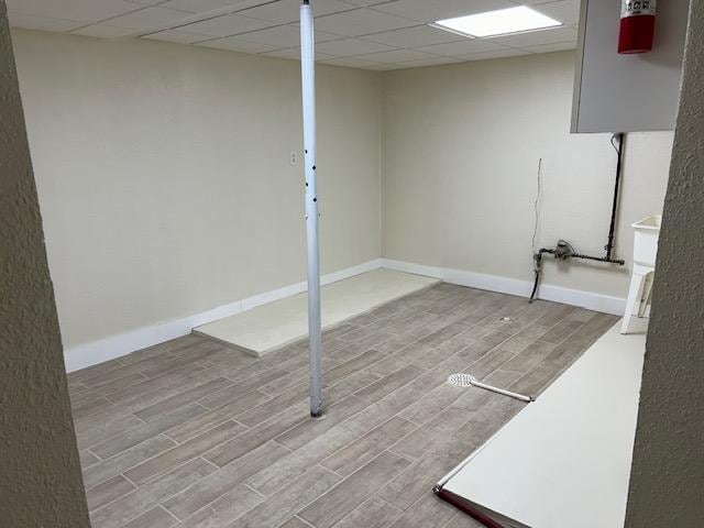 504 8th Ave, Grand Rapids, MN 55744 - finished basement with wood finished floors and a drop ceiling