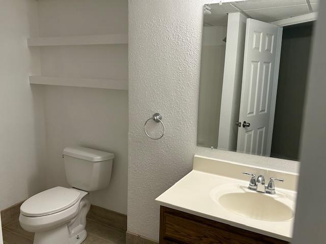 504 8th Ave, Grand Rapids, MN 55744 - bathroom with vanity and tile patterned floors