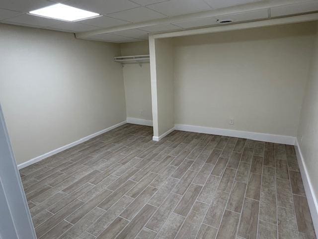 504 8th Ave, Grand Rapids, MN 55744 - finished below grade area featuring wood finished floors and a paneled ceiling