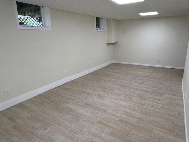 504 8th Ave, Grand Rapids, MN 55744 - finished basement featuring light wood finished floors and a paneled ceiling