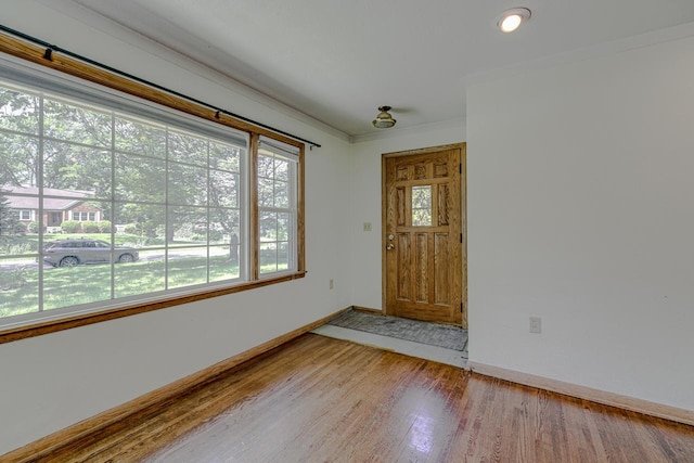 1970 Maryknoll Ave, Maplewood, MN 55109 - foyer entrance featuring baseboards and wood finished floors