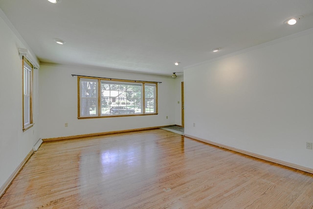 1970 Maryknoll Ave, Maplewood, MN 55109 - spare room featuring light wood-type flooring, crown molding, and recessed lighting