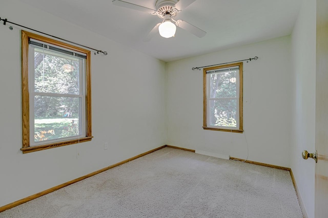 1970 Maryknoll Ave, Maplewood, MN 55109 - unfurnished room featuring plenty of natural light, carpet flooring, and ceiling fan