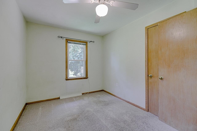 1970 Maryknoll Ave, Maplewood, MN 55109 - empty room featuring carpet floors and a ceiling fan
