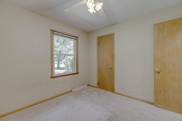 1970 Maryknoll Ave, Maplewood, MN 55109 - unfurnished bedroom featuring carpet flooring and ceiling fan