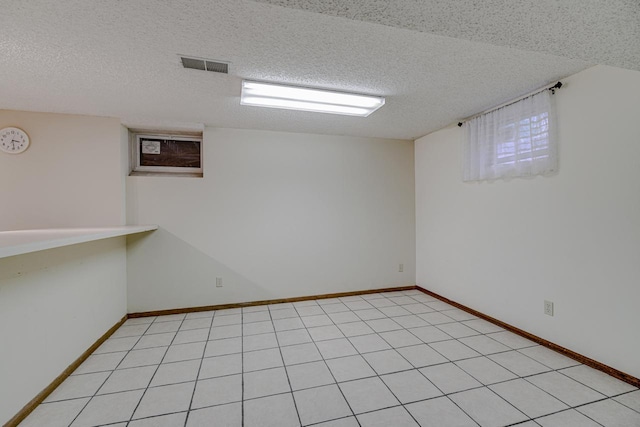 1970 Maryknoll Ave, Maplewood, MN 55109 - basement featuring a textured ceiling and baseboards