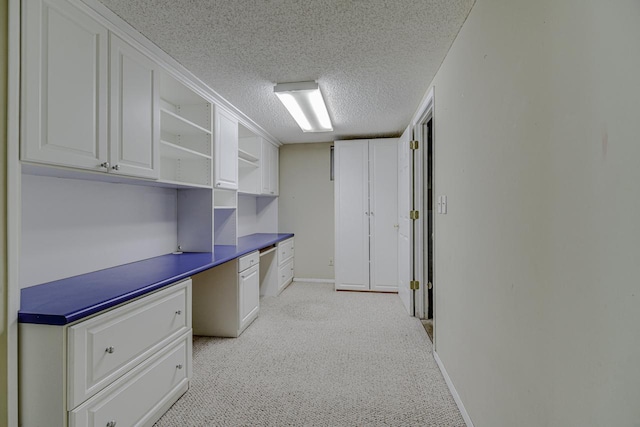 1970 Maryknoll Ave, Maplewood, MN 55109 - unfurnished office featuring built in study area, a textured ceiling, and light colored carpet