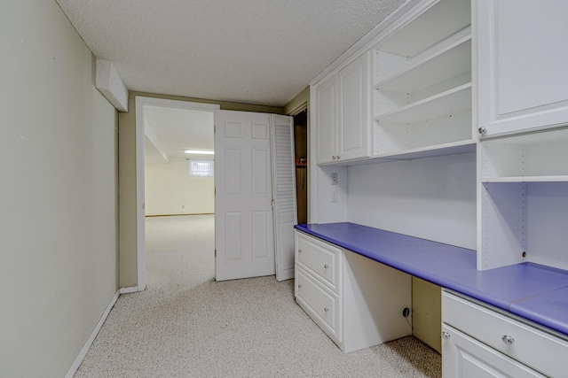 1970 Maryknoll Ave, Maplewood, MN 55109 - unfurnished office with built in study area and a textured ceiling