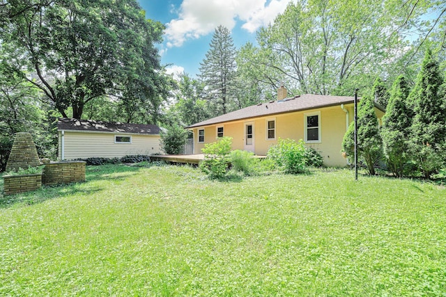 1970 Maryknoll Ave, Maplewood, MN 55109 - view of green lawn featuring a wooden deck