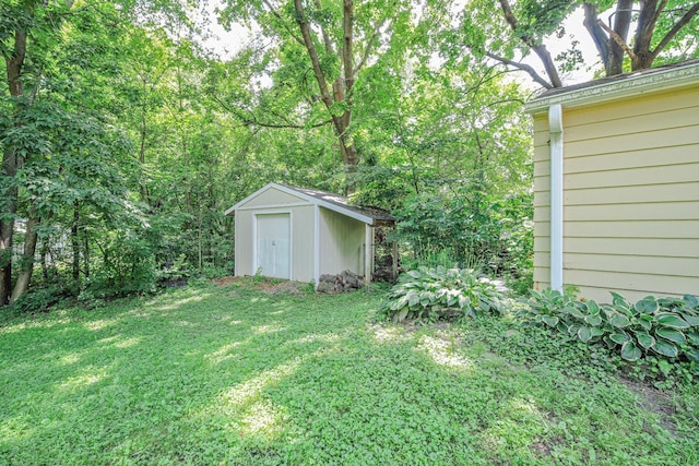 1970 Maryknoll Ave, Maplewood, MN 55109 - view of green lawn featuring a storage unit