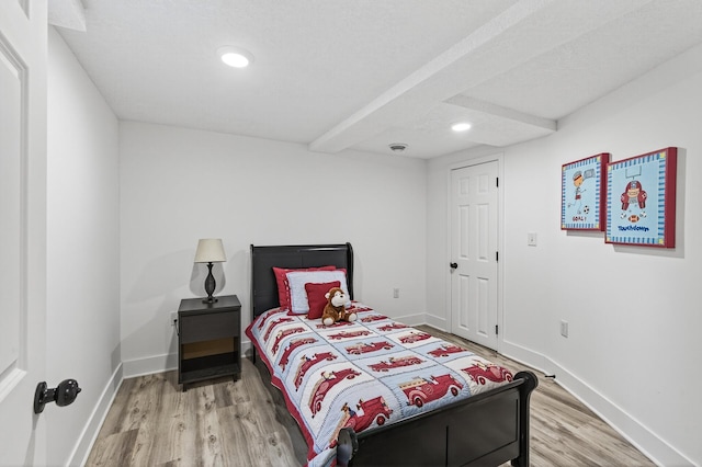 4301 Columbus Ave, Minneapolis, MN 55407 - bedroom featuring wood finished floors and recessed lighting