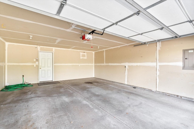 5607 100th Ln N, Brooklyn Park, MN 55443 - garage with electric panel and a garage door opener