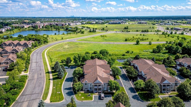 5607 100th Ln N, Brooklyn Park, MN 55443 - aerial perspective of suburban area featuring a large body of water