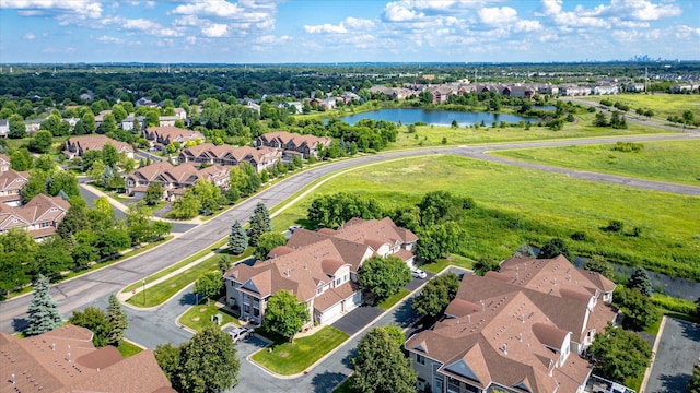 5607 100th Ln N, Brooklyn Park, MN 55443 - aerial perspective of suburban area featuring a large body of water