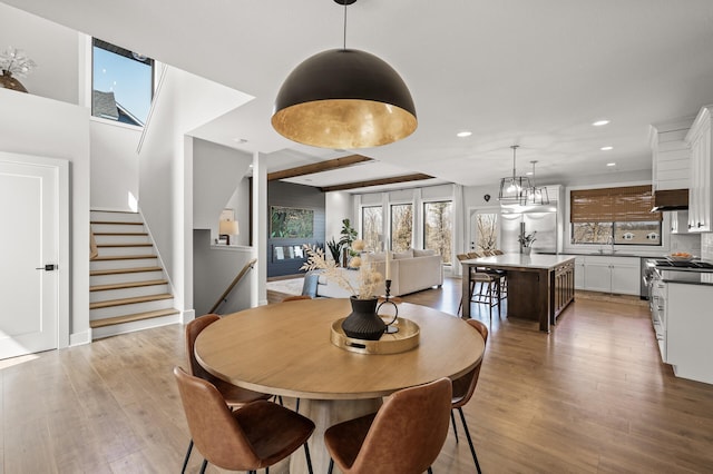 16830 59th Ave N, Plymouth, MN 55446 - dining area featuring recessed lighting, stairs, and wood finished floors