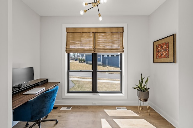 16830 59th Ave N, Plymouth, MN 55446 - office space with a chandelier and wood finished floors