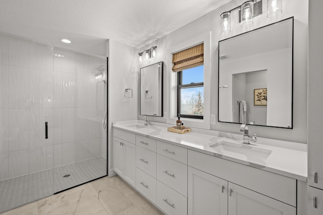 16830 59th Ave N, Plymouth, MN 55446 - bathroom featuring double vanity, a stall shower, marble finish flooring, a textured ceiling, and recessed lighting