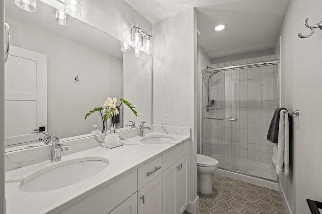 16830 59th Ave N, Plymouth, MN 55446 - bathroom featuring double vanity, a shower stall, recessed lighting, and tile patterned floors