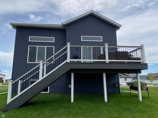 1819 67th Ave S, Fargo, ND 58104 - back of property featuring a yard, a deck, and stairway
