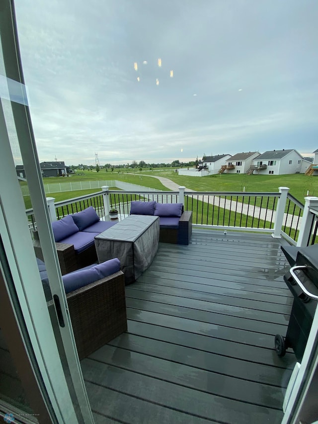 1819 67th Ave S, Fargo, ND 58104 - deck with outdoor lounge area, a yard, and view of golf course