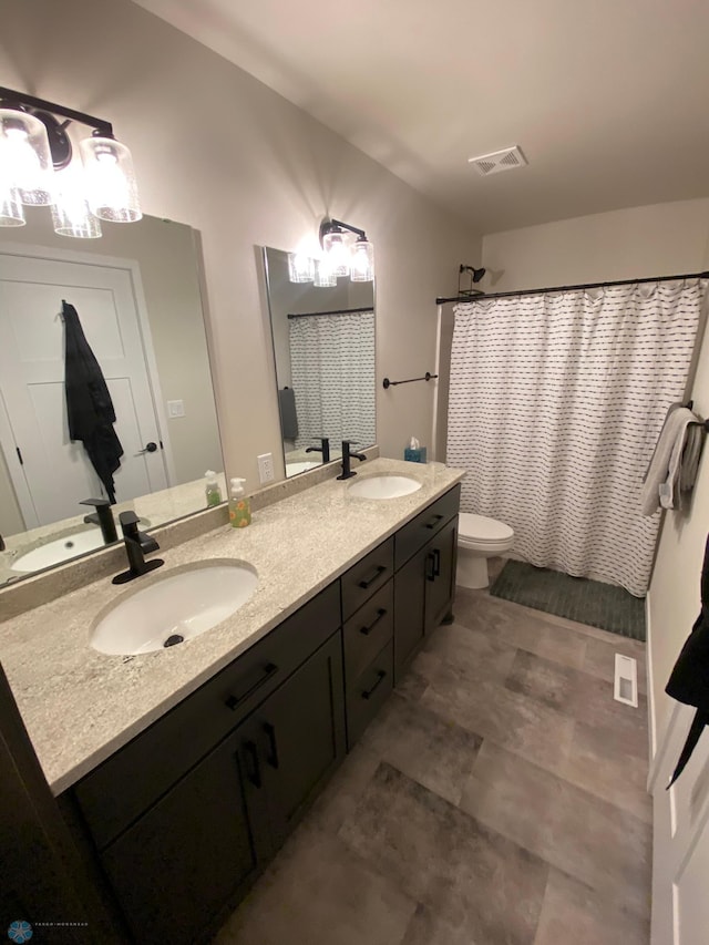 1819 67th Ave S, Fargo, ND 58104 - bathroom with double vanity and a shower with curtain