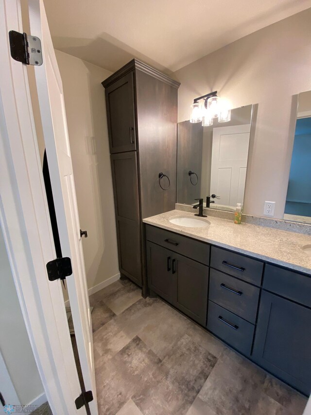 1819 67th Ave S, Fargo, ND 58104 - bathroom featuring double vanity