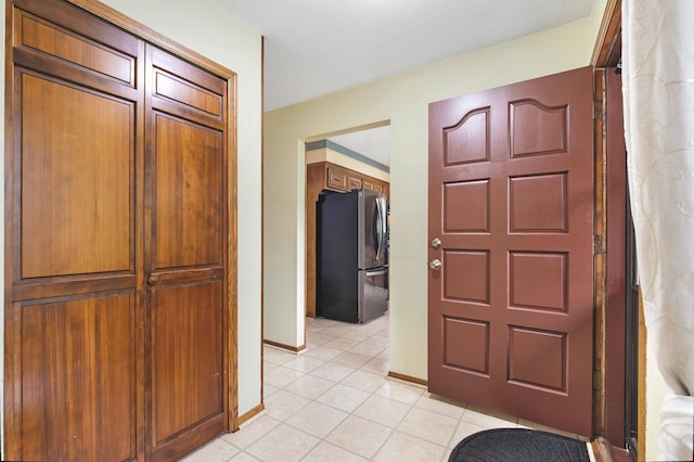 2539 83rd Ct N, Brooklyn Park, MN 55444 - foyer entrance featuring light tile patterned flooring and baseboards