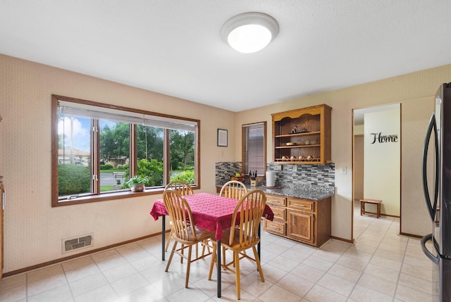 2539 83rd Ct N, Brooklyn Park, MN 55444 - dining space featuring baseboards