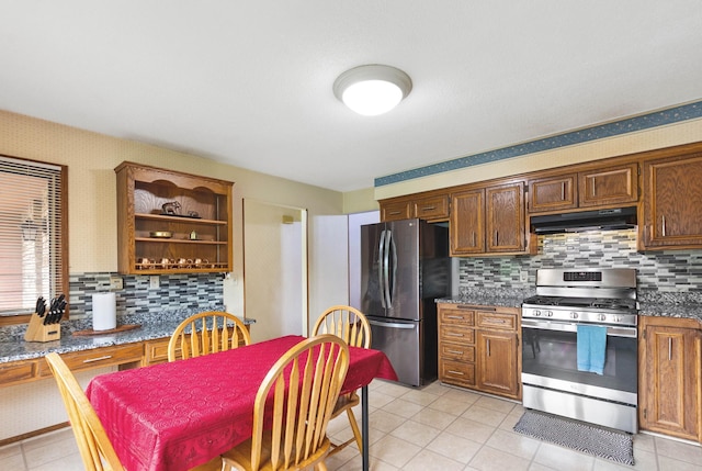 2539 83rd Ct N, Brooklyn Park, MN 55444 - kitchen with appliances with stainless steel finishes, open shelves, tasteful backsplash, under cabinet range hood, and light tile patterned floors