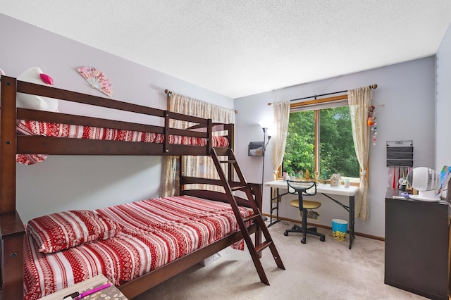 2539 83rd Ct N, Brooklyn Park, MN 55444 - carpeted bedroom featuring a textured ceiling and baseboards
