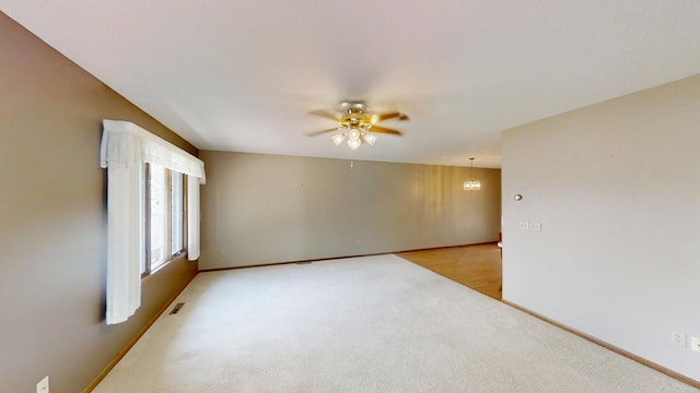 1930 Wilby Rd, Albert Lea, MN 56007 - carpeted empty room featuring ceiling fan and baseboards