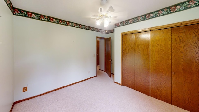 1930 Wilby Rd, Albert Lea, MN 56007 - unfurnished bedroom featuring carpet flooring, a closet, and ceiling fan