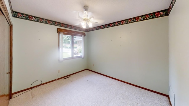 1930 Wilby Rd, Albert Lea, MN 56007 - unfurnished room featuring carpet flooring and a ceiling fan
