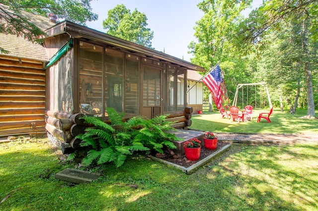 31759 County 30, Laporte, MN 56461 - view of grassy yard with a sunroom