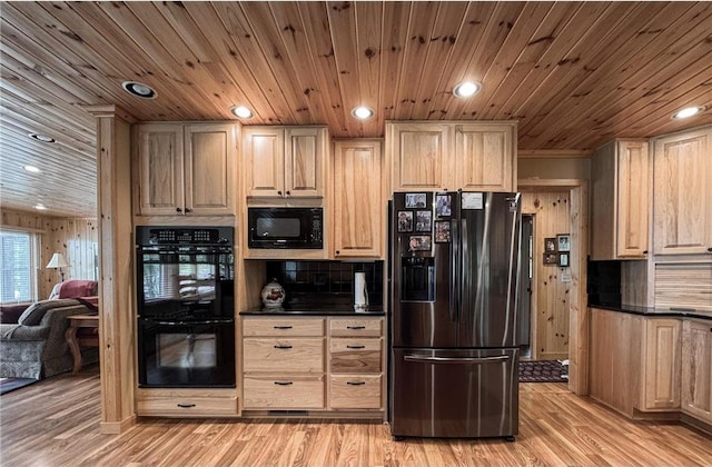 7310 Moose Lake Rd NE, Blackduck, MN 56630 - kitchen with black appliances, dark countertops, recessed lighting, light wood finished floors, and decorative backsplash