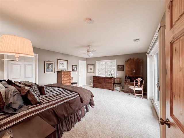 7310 Moose Lake Rd NE, Blackduck, MN 56630 - bedroom featuring light colored carpet and ceiling fan
