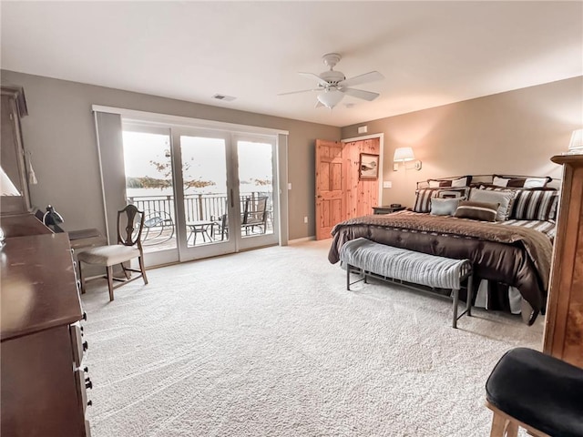 7310 Moose Lake Rd NE, Blackduck, MN 56630 - bedroom with access to outside, light colored carpet, a ceiling fan, and french doors