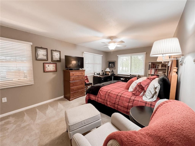 7310 Moose Lake Rd NE, Blackduck, MN 56630 - carpeted bedroom with baseboards and a ceiling fan