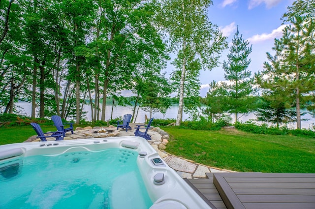 16267 Conners Ln, Sand Lake Twp, WI 54876 - view of pool featuring a fire pit, a lawn, and a water view
