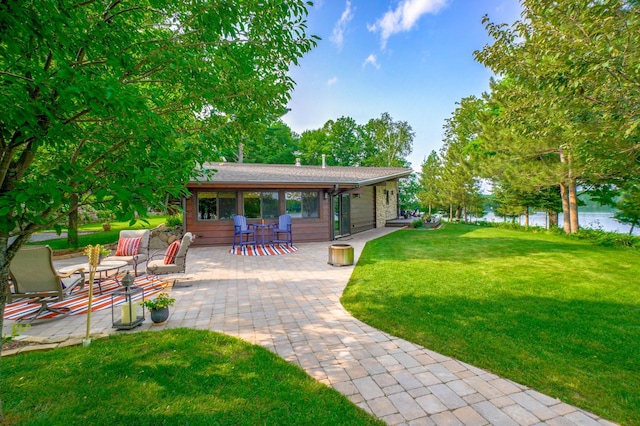 16267 Conners Ln, Sand Lake Twp, WI 54876 - view of patio featuring a water view