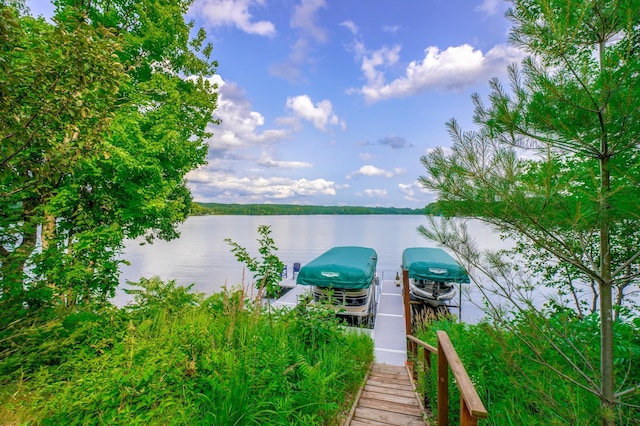 16267 Conners Ln, Sand Lake Twp, WI 54876 - dock area featuring boat lift and a water view