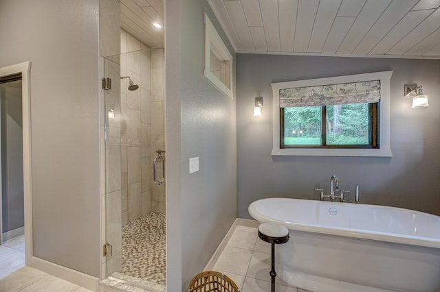 16267 Conners Ln, Sand Lake Twp, WI 54876 - full bath with a freestanding bath, a stall shower, tile patterned floors, and wooden ceiling