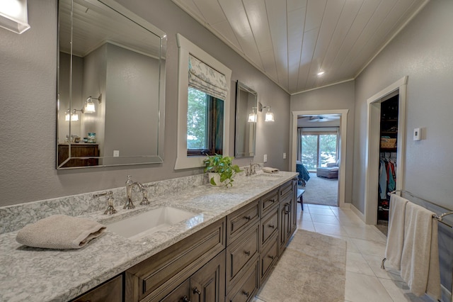 16267 Conners Ln, Sand Lake Twp, WI 54876 - full bathroom featuring double vanity, tile patterned floors, and ornamental molding
