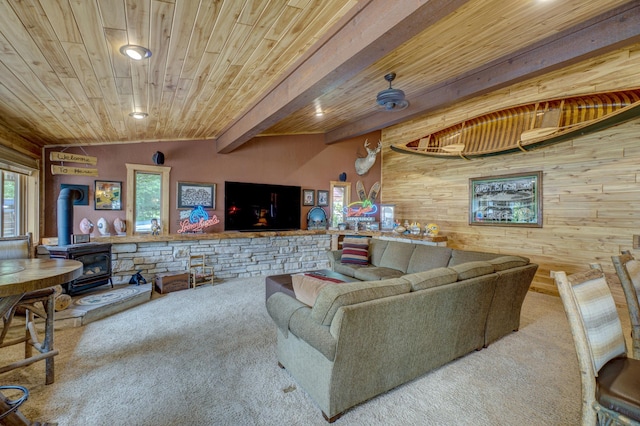 16267 Conners Ln, Sand Lake Twp, WI 54876 - living area featuring carpet, wooden ceiling, a wood stove, and wood walls