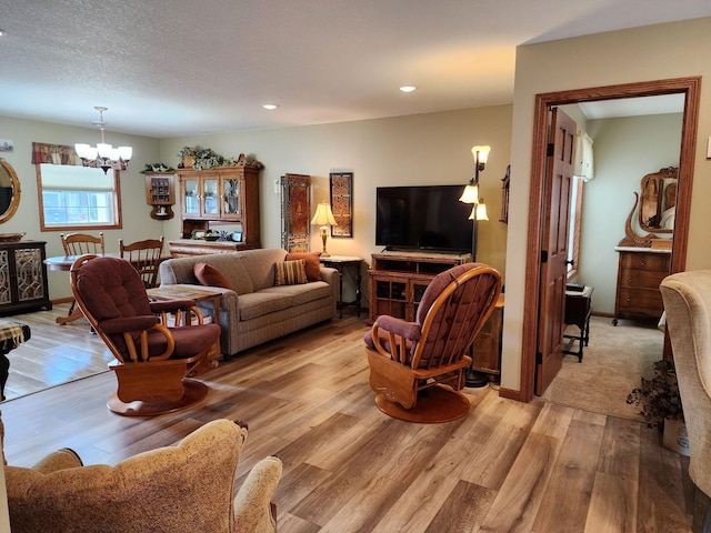 307 14th St N, Cold Spring, MN 56320 - living area featuring a chandelier, light wood-type flooring, and recessed lighting