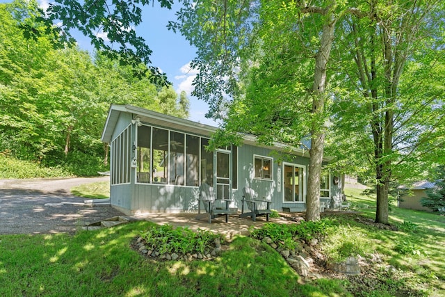 20592 Lehmicke Ln, Trade Lake, WI 54853 - view of front facade with a sunroom