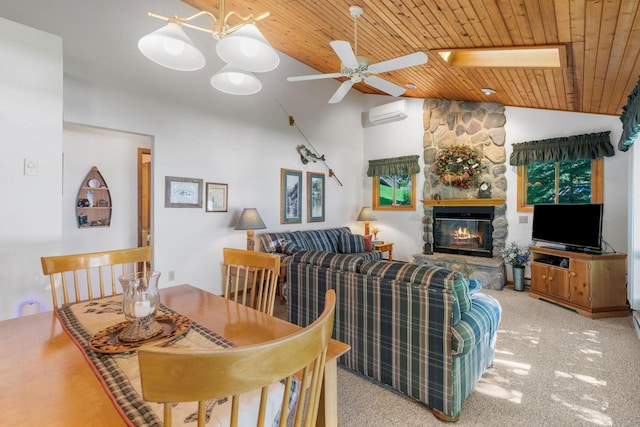 20592 Lehmicke Ln, Trade Lake, WI 54853 - carpeted dining area featuring wooden ceiling, vaulted ceiling, ceiling fan, a fireplace, and a skylight