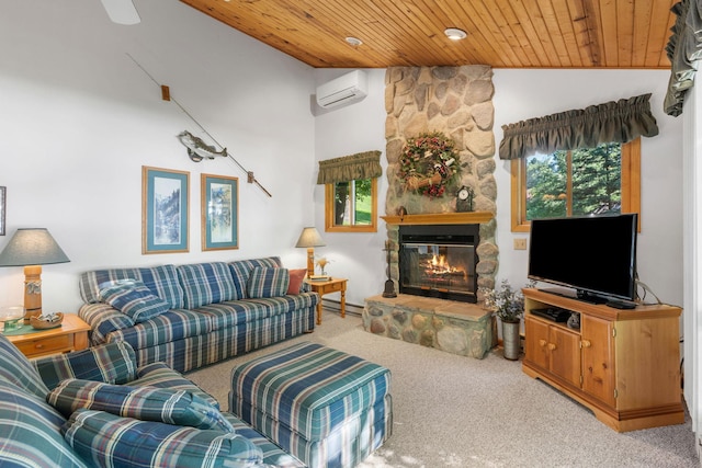 20592 Lehmicke Ln, Trade Lake, WI 54853 - living room with a wall mounted AC, wood ceiling, carpet flooring, a stone fireplace, and a baseboard heating unit