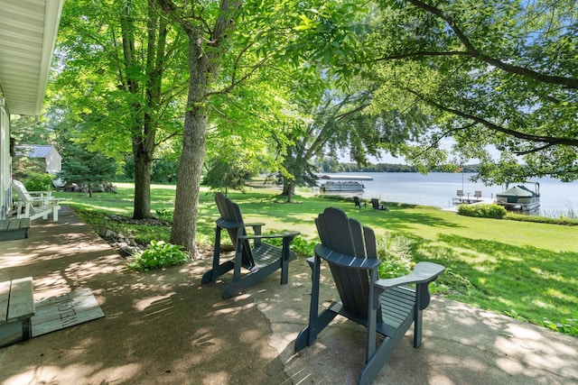 20592 Lehmicke Ln, Trade Lake, WI 54853 - view of property's community featuring a water view, a lawn, and a patio